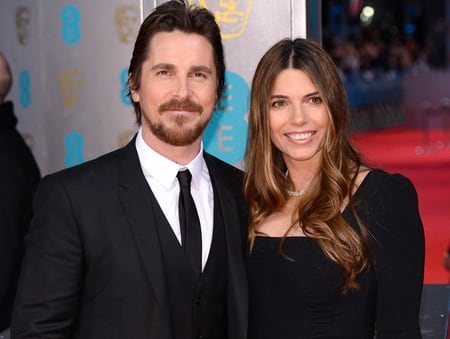 Christian Bale with his wife Bazic at an award show